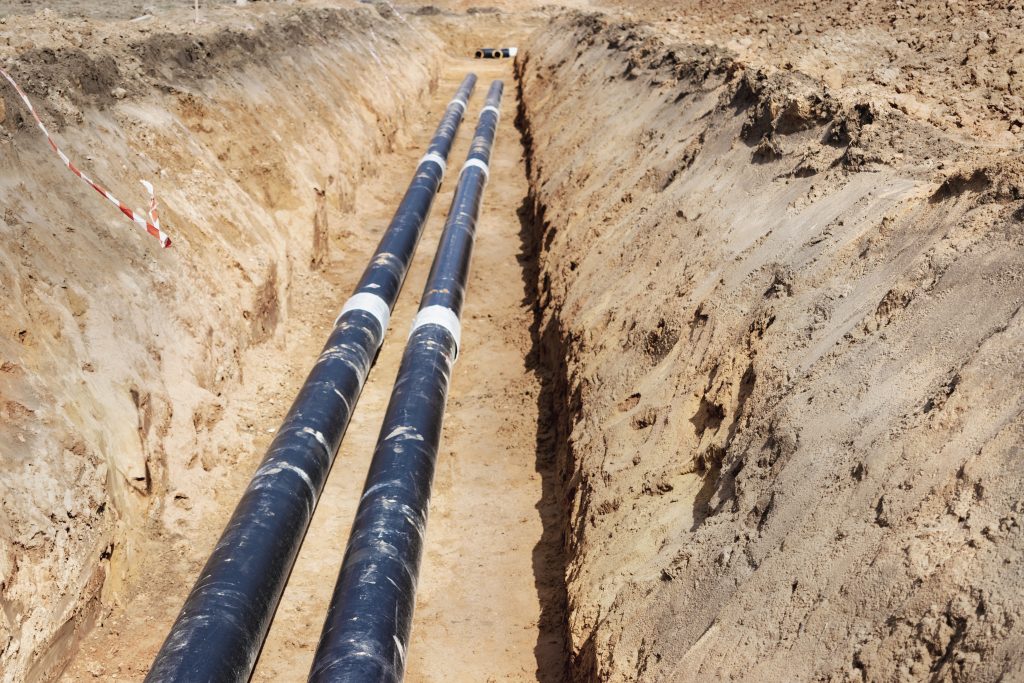 Underground drainage pipes placed in a constructed pathway as part of modern pipeline infrastructure in Hyderabad by Leenus India.