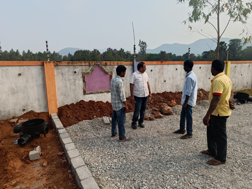 People are inspecting the site work after completion of the project.